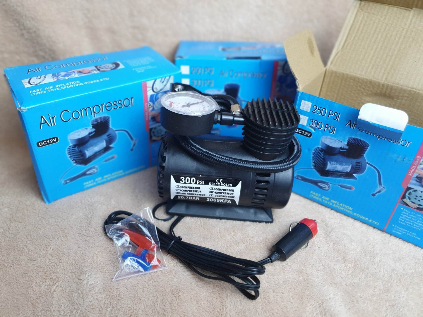 ម៉ាស៊ីនសប់កង់ 12V Portable Air Compressor Electric Pump ABS